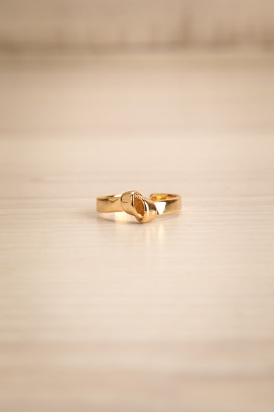 Johvi Or Open Golden Ring with Knot Detail flat view | La Petite Garçonne