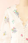 Jolyne Beige Floral Buttonned Midi Dress | Boutique 1861 front close-up