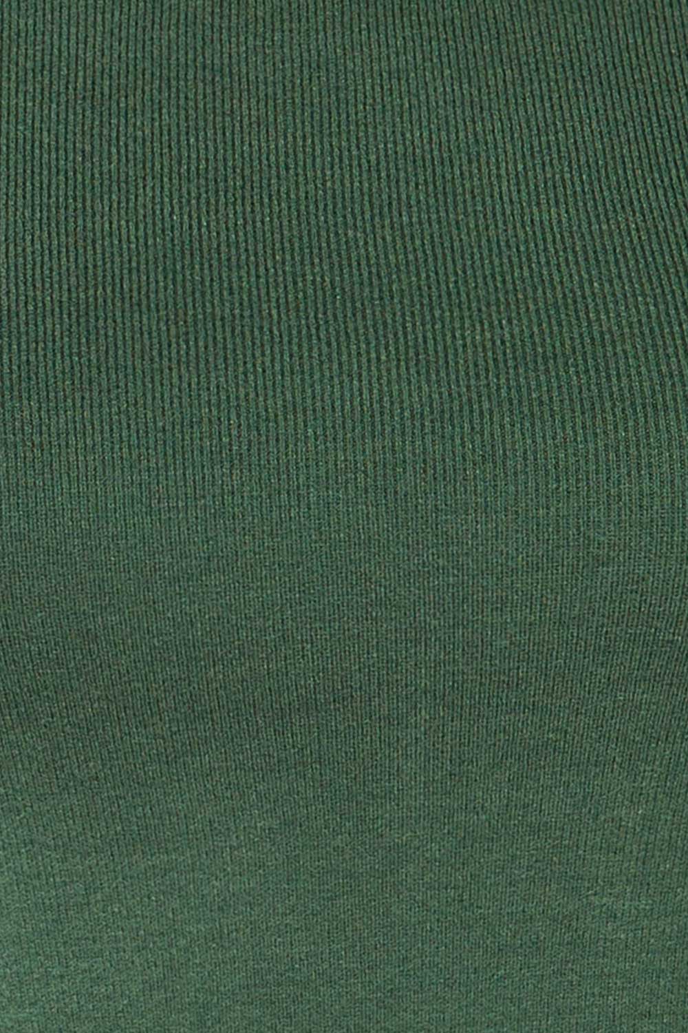 Jorden Green Long Sleeve Crossed Back Top | La Petite Garçonne fabric