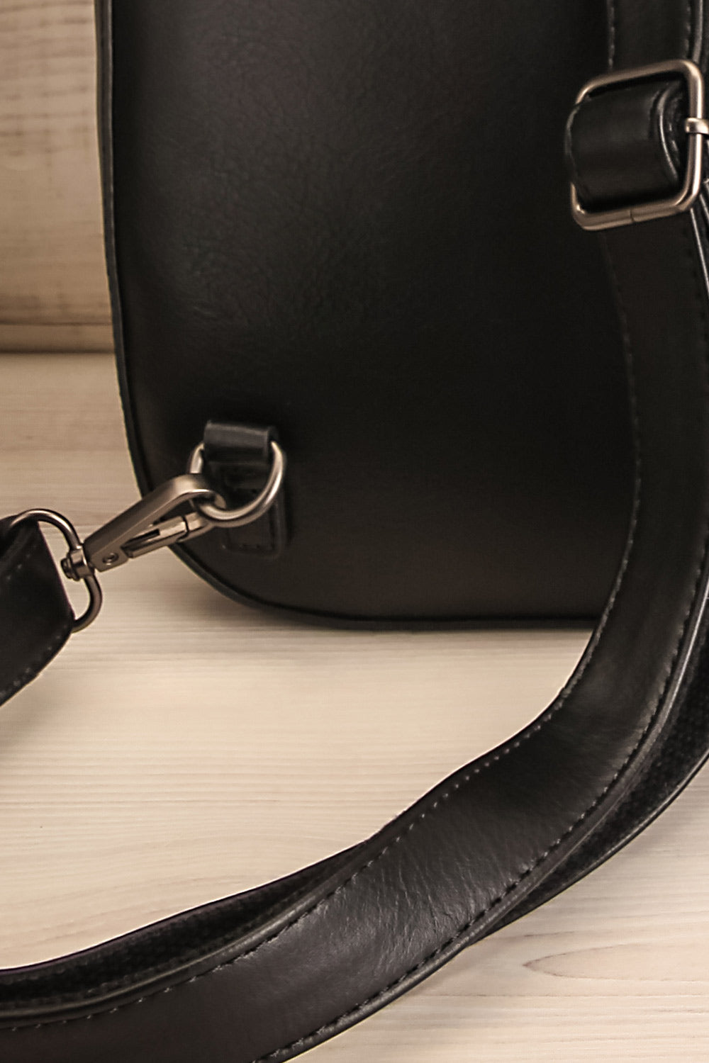 Kanacea Black Vegan Leather Backpack | La petite garçonne straps close-up