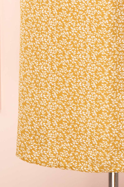 Kathya Yellow Floral Short Sleeve Midi Dress | Boutique 1861 bottom
