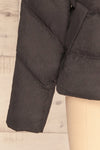 Katowice Dark Grey Quilted Coat w/ Faux Fur Hood | La Petite Garçonne bottom close-up