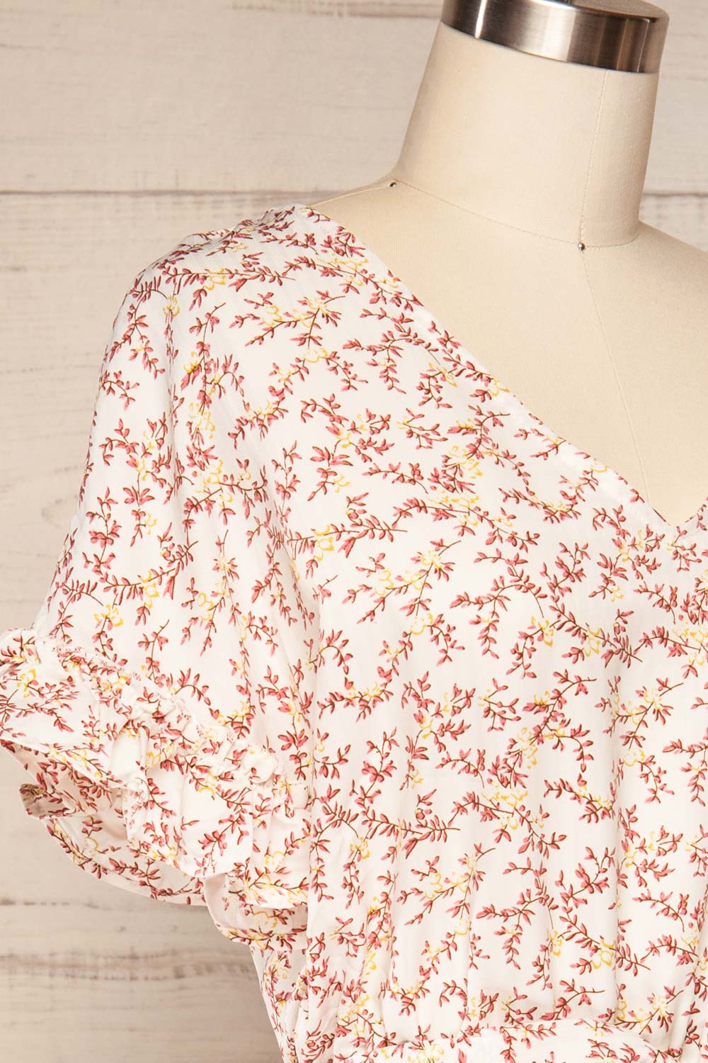Kerava White Floral Romper w/ Fabric Belt | La petite garçonne side close up