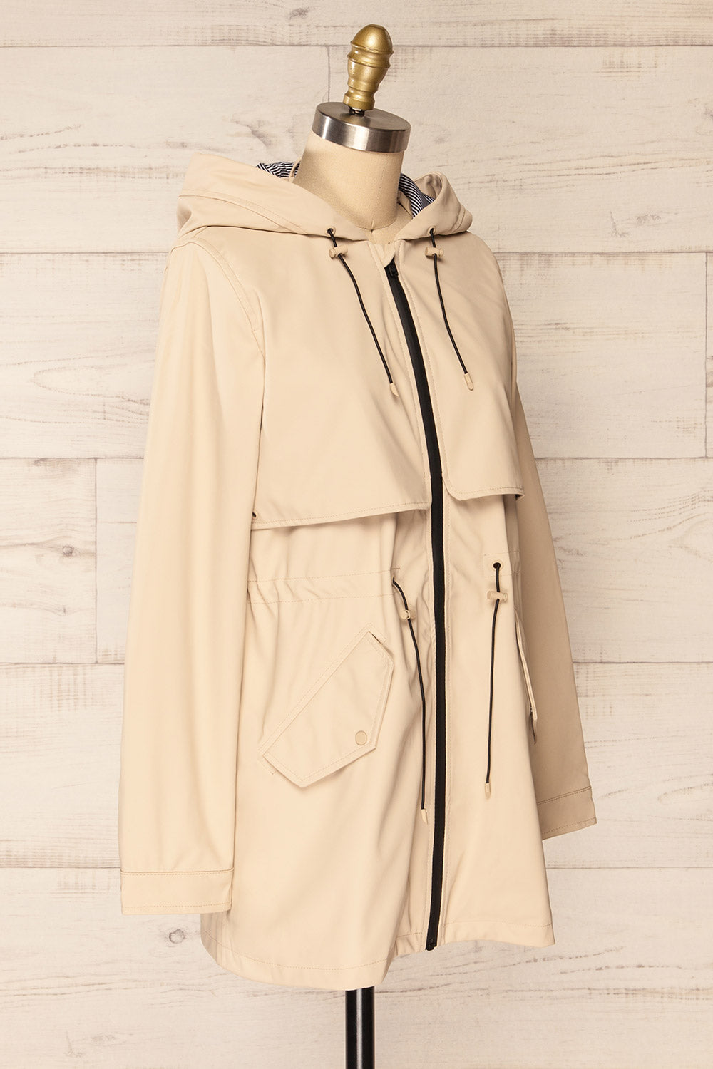 Kharokopion Beige Hooded Raincoat w/ Drawstring | La petite garçonne  side view 