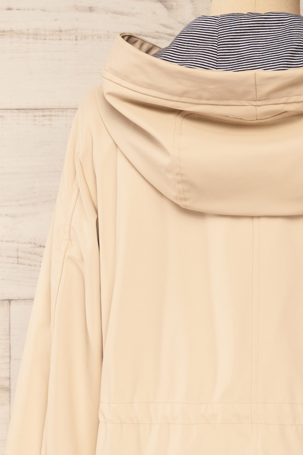 Kharokopion Beige Hooded Raincoat w/ Drawstring | La petite garçonne back close-up