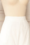 Khori White High-Waisted Embroidered Shorts | La petite garçonne  side close-up