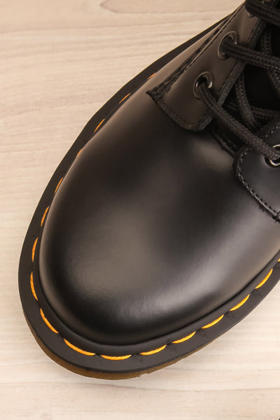 Kirkbride Leather Black Dr. Martens Boots flat lay close-up | La Petite Garçonne