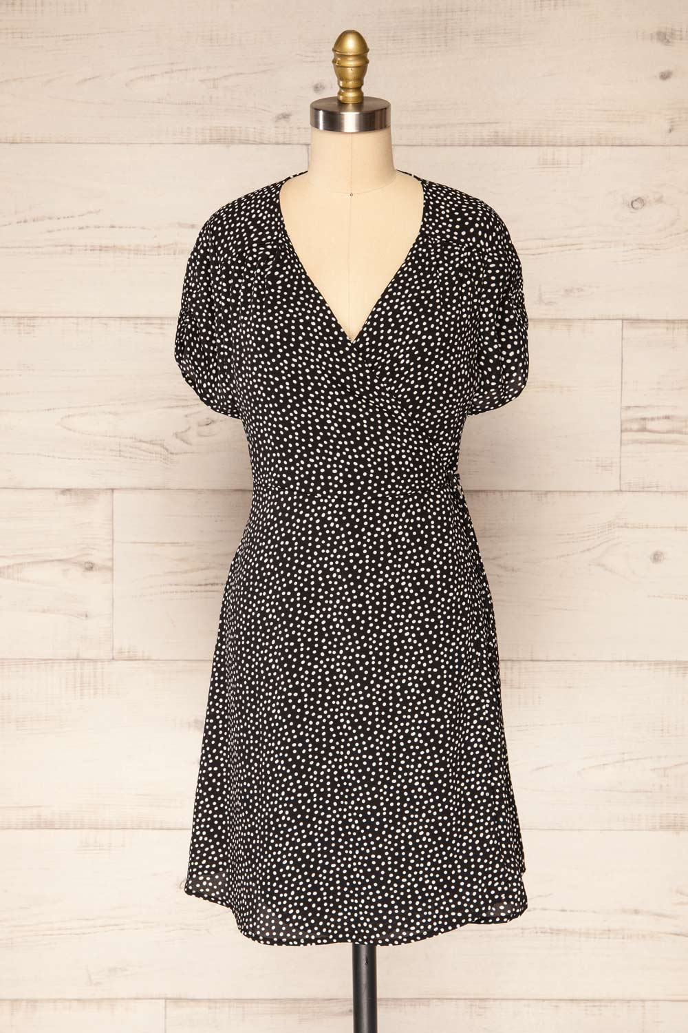 Krustil Black Polka Dot Short Wrap Dress | La petite garçonne front view