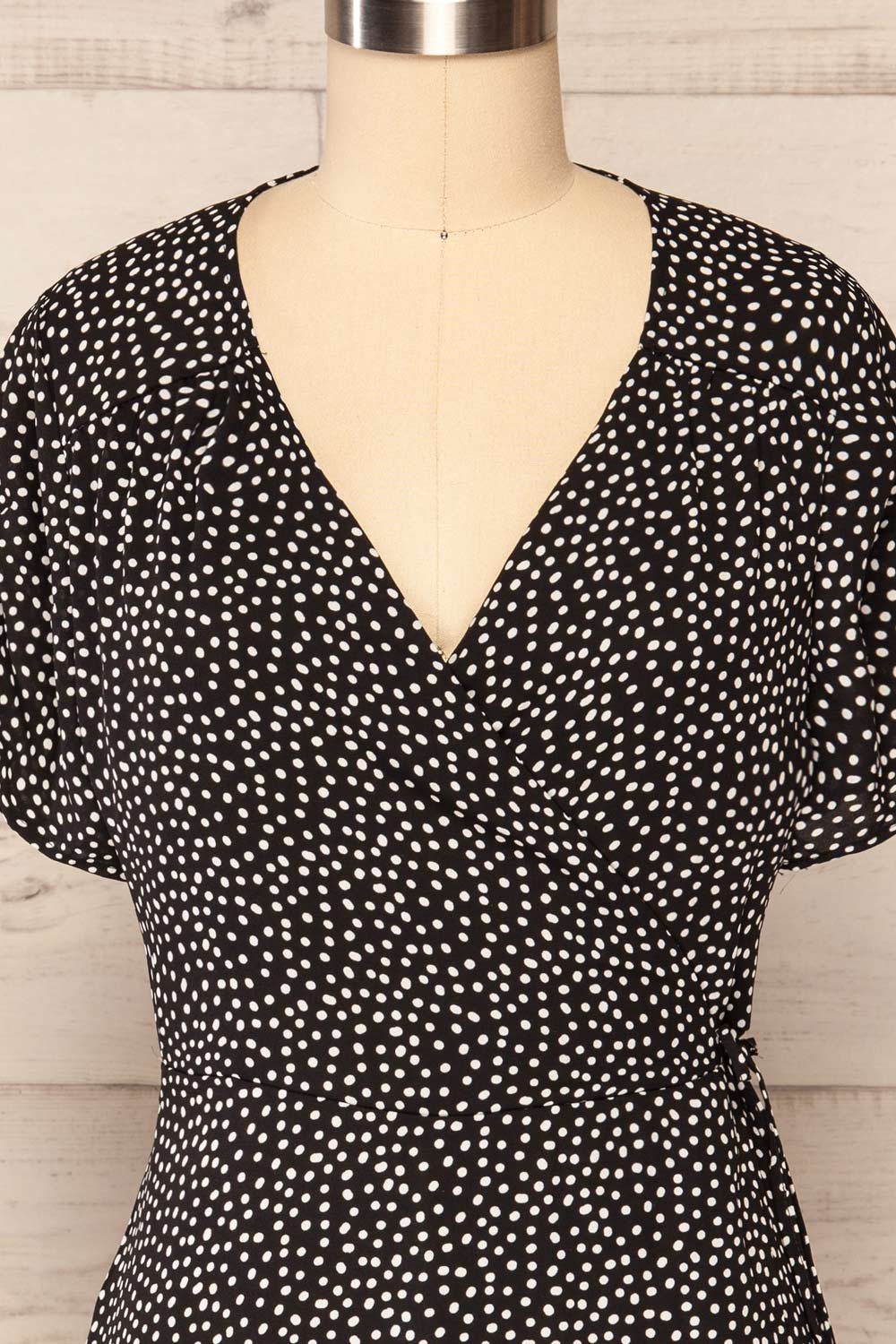 Krustil Black Polka Dot Short Wrap Dress | La petite garçonne front close up