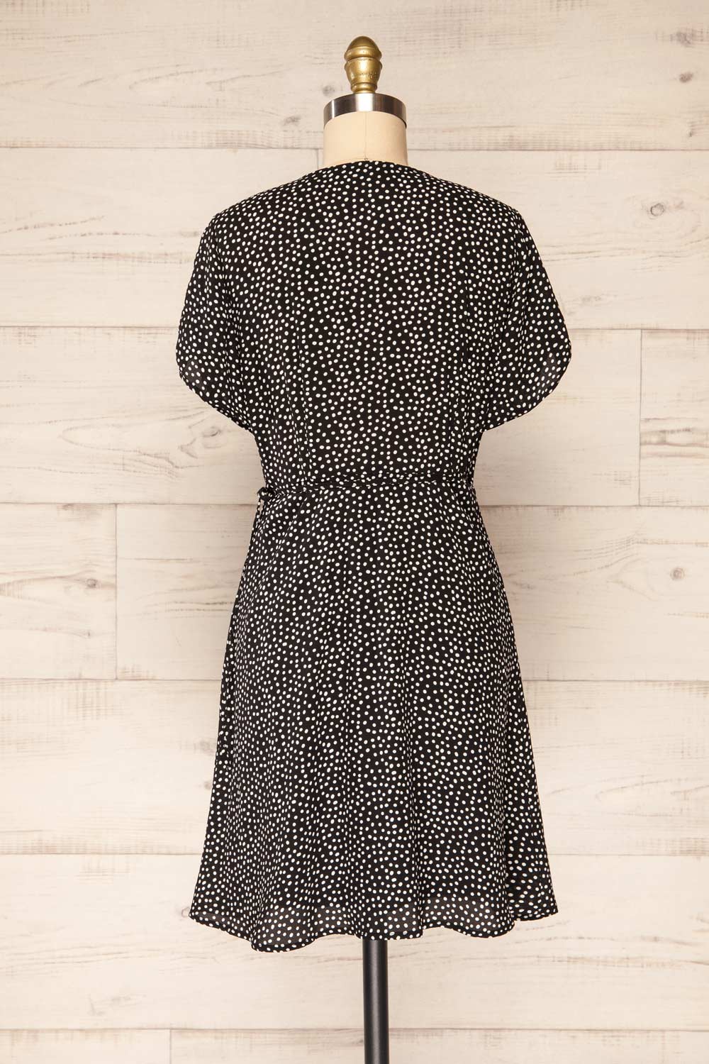 Krustil Black Polka Dot Short Wrap Dress | La petite garçonne back view