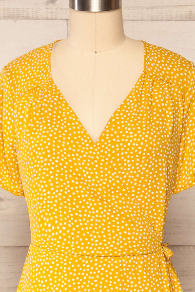 Krustil Mustard Polka Dot Short Wrap Dress | La petite garçonne front close up