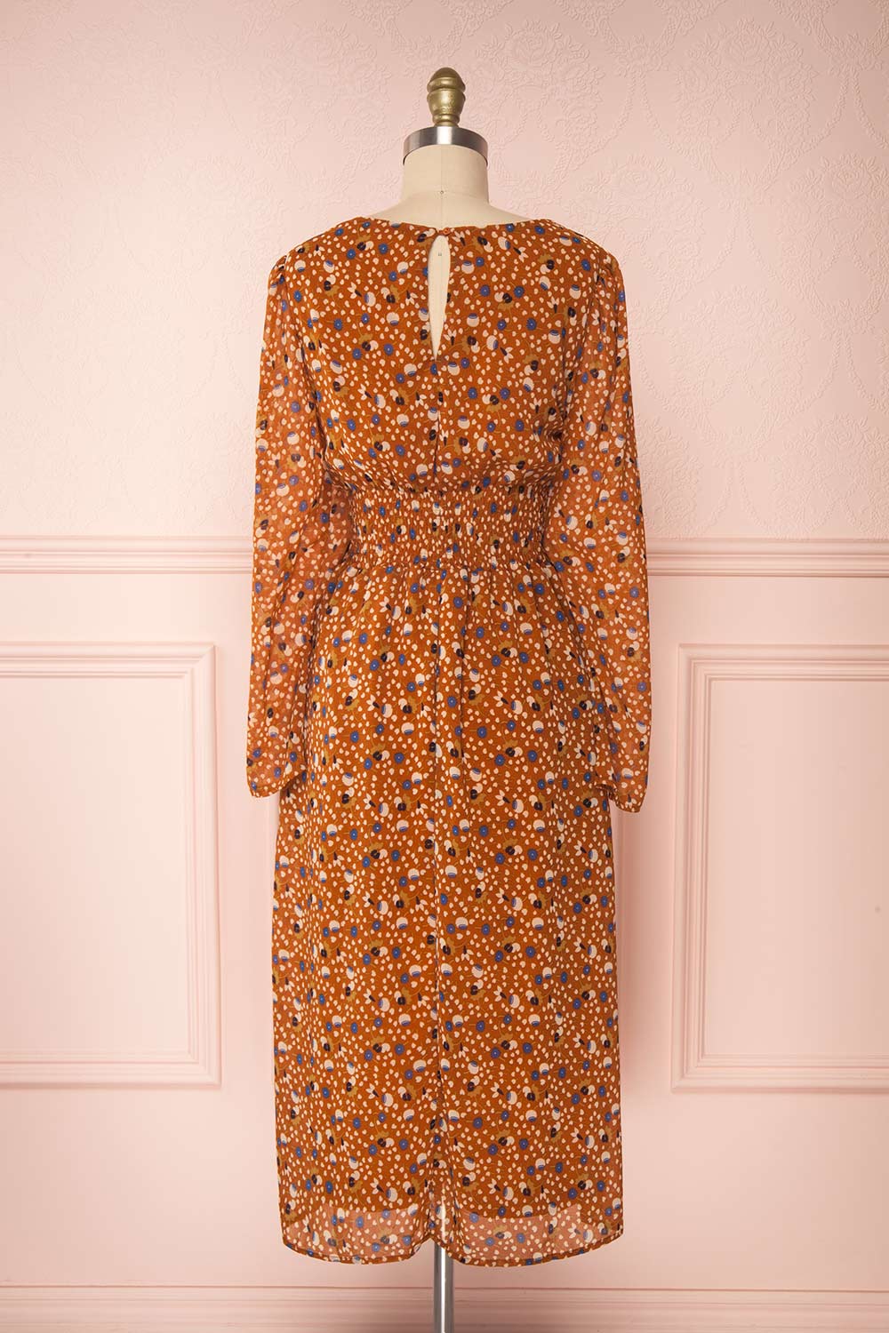 Kyrylo Ochre Floral Midi Dress w/ Long Sleeves | Boutique 1861 back view 