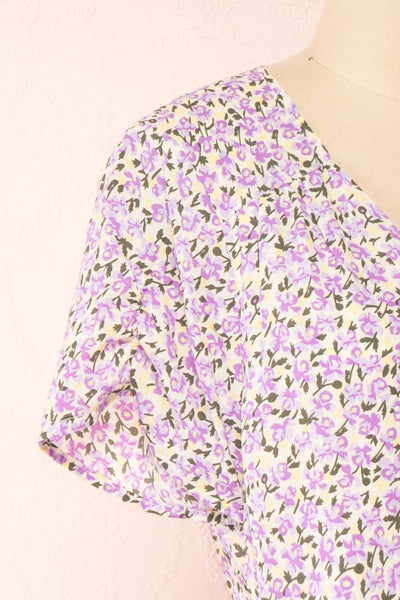 Lauryna Purple Floral Short Sleeve Wrap Dress | Boutique 1861 side close-up
