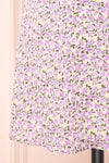 Lauryna Purple Floral Short Sleeve Wrap Dress | Boutique 1861 bottom close-up