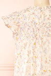 Lerona Short Floral Dress w/ Ruffles | Boutique 1861 back close-up