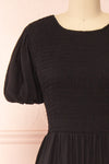 Lilou Black Open-back Midi Dress w/ Puffy Sleeves | Boutique 1861 front close-up