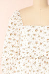 Linea White Floral Short Dress w/ Puffy Sleeves | Boutique 1861  front close-up