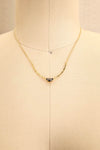 Liza Minneli Black & Golden Pendant Necklace on mannequin | La Petite Garçonne