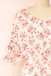 Lucretia Beige V-Neck Floral Midi Dress w/ Buttons | Boutique 1861 front close-up