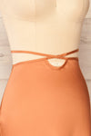 Maddie Rust Satin Midi Skirt | La petite garçonne  side close-up