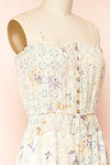 Marbella Floral Print Flared Leg Jumpsuit | Boutique 1861 side close-up