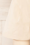 Marsala Cream High-Waisted Pleated Shorts | La petite garçonne back close-up