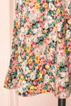 Martha Short Sleeve Wrap Neck Floral Dress | Boutique 1861 bottom close-up