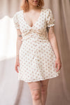 Marva White Floral V-Neck Short Sleeve Dress | Boutique 1861 on model