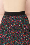 Maura Black & Colourful Floral Pleated Midi Skirt | BACK CLOSE UP | Boutique 1861