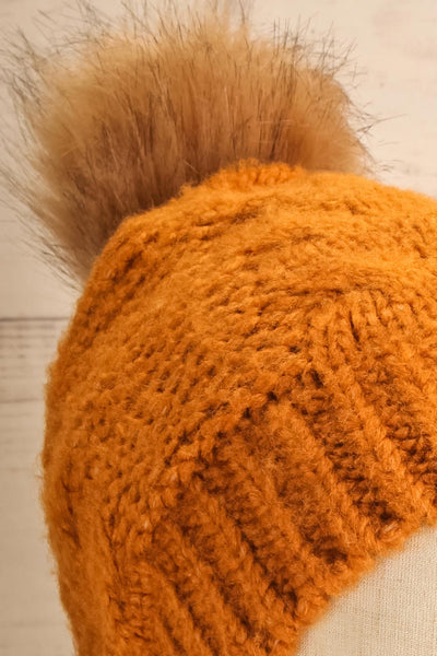Meppel Orange Knit Tuque with Faux-Fur Pompom close-up | La Petite Garçonne