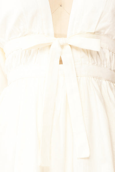 Mertille Short Ivory Dress w/ Long Sleeves | Boutique 1861 bow close-up