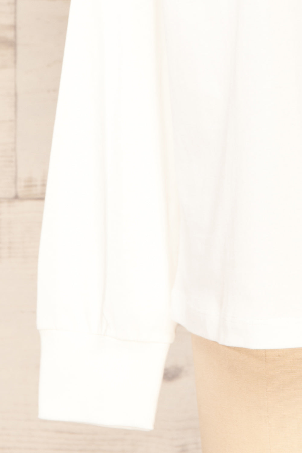 Mielec White Long Sleeve Top | La petite garçonne sleeve close-up