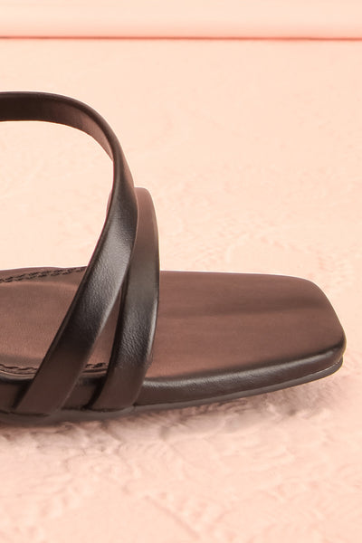 Mouvemente Black Crossed Strap High Heel Sandals | Boutique 1861 side close-up