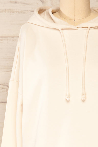 Munich Beige Long Sleeve Hooded Sweatshirt | La petite garçonne  front close-up