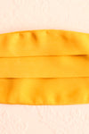 Mustard Satin Pleated Face Mask | Boutique 1861 close-up