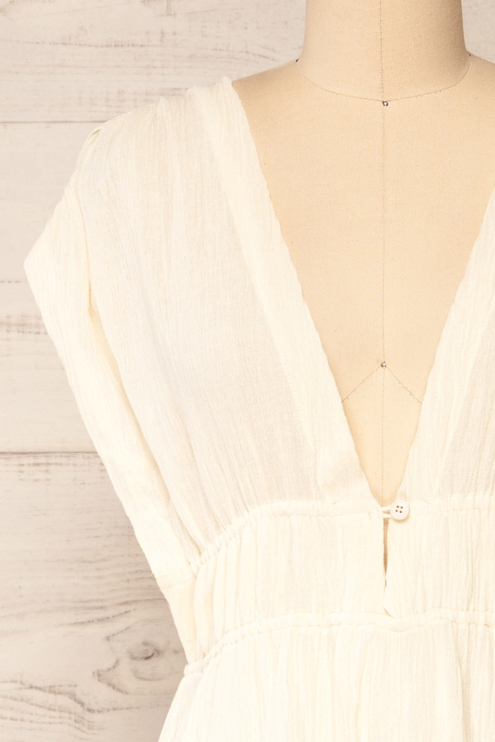 Naneroi Ivory V-Neck Midi Dress | La petite garçonne front close-up