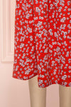 Naoka Mini Red Floral Midi A-Line Dress | Boutique 1861 bottom close-up
