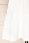 Nefertari Short White V-Neck Dress | La petite garçonne bottom close-up