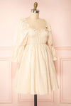 Nolla Babydoll Beige Gingham Dress w/ Flower Detailing | Boutique 1861 side view