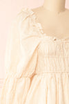 Nolla Babydoll Beige Gingham Dress w/ Flower Detailing | Boutique 1861 side close-up