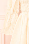 Nolla Babydoll Beige Gingham Dress w/ Flower Detailing | Boutique 1861 sleeve