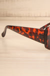 Okh Tortoise Rectangular Frame Sunglasses | La petite garçonne branch close-up
