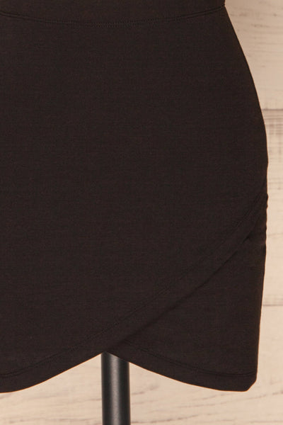Olecko Noir Black Short Wrap Skirt | BOTTOM  CLOSE UP | La Petite Garçonne