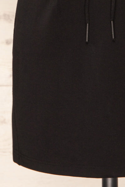 Olkusz Black High-Waisted Short Skirt | La petite garçonne bottom close-up
