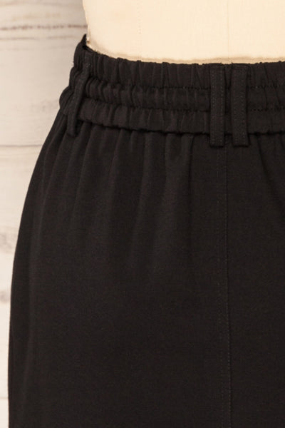 Olkusz Black High-Waisted Short Skirt | La petite garçonne back close-up
