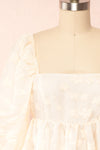 Olympe Cream Babydoll Dress w/ Flowers | Boutique 1861 front close up