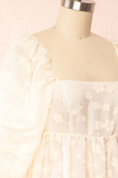 Olympe Cream Babydoll Dress w/ Flowers | Boutique 1861  side close up