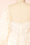 Olympe Cream Babydoll Dress w/ Flowers | Boutique 1861 back close up