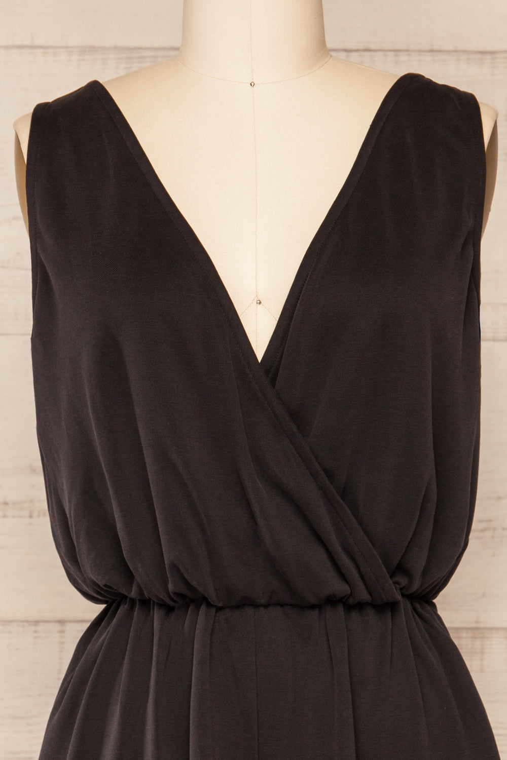 Opoczno Black Sleeveless Plunging Neckline Romper | La petite garçonne front close-up