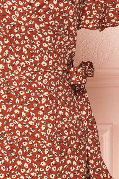 Oxylos Brown Floral Short Wrap Dress w/ Ruffles | Boutique 1861 bow close-up
